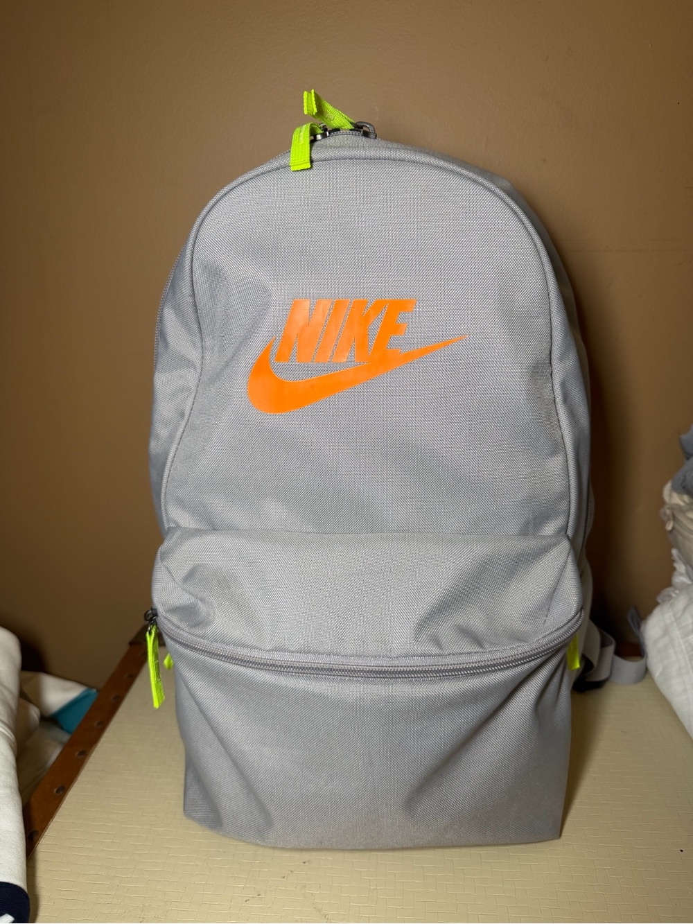 Nike Light Gray Backpack with Bright Orange Logo and Neon Accents